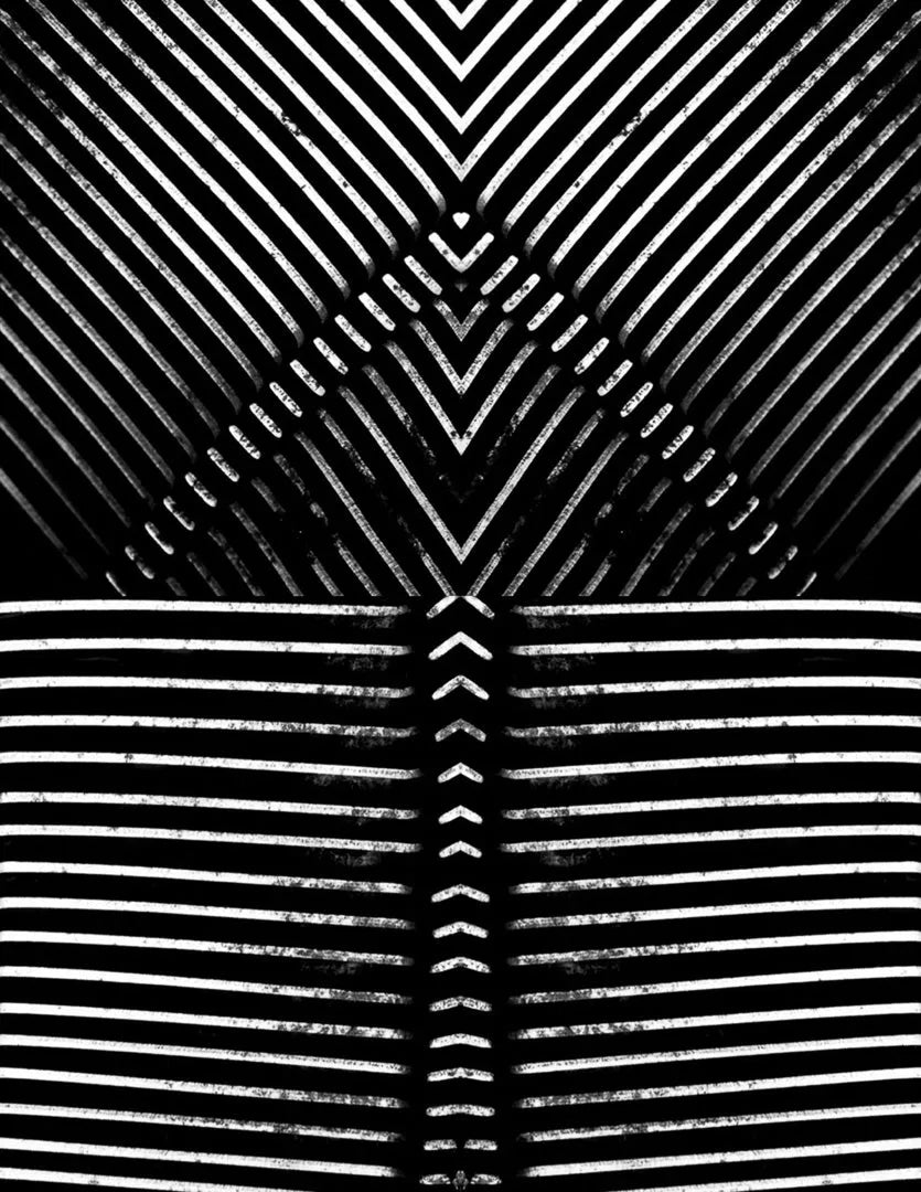 Black and white fine art photograph Macroillusions I-IV by Ziggy Kańczukowski featuring a geometric pattern with wavy lines.