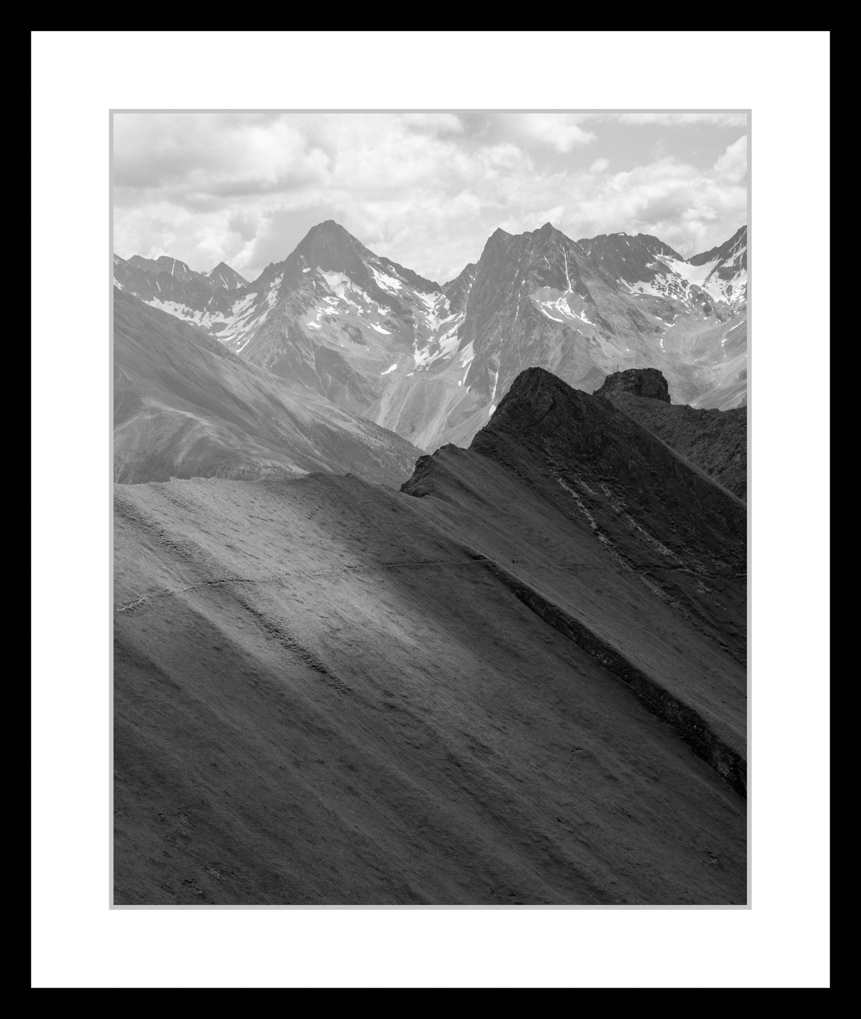 Black and white photograph of a misty alpine landscape in the High Tauern range, focusing on soft tonal transitions, from the series High Tauern. The Zone Studies III by Ziggy Kanczukowski