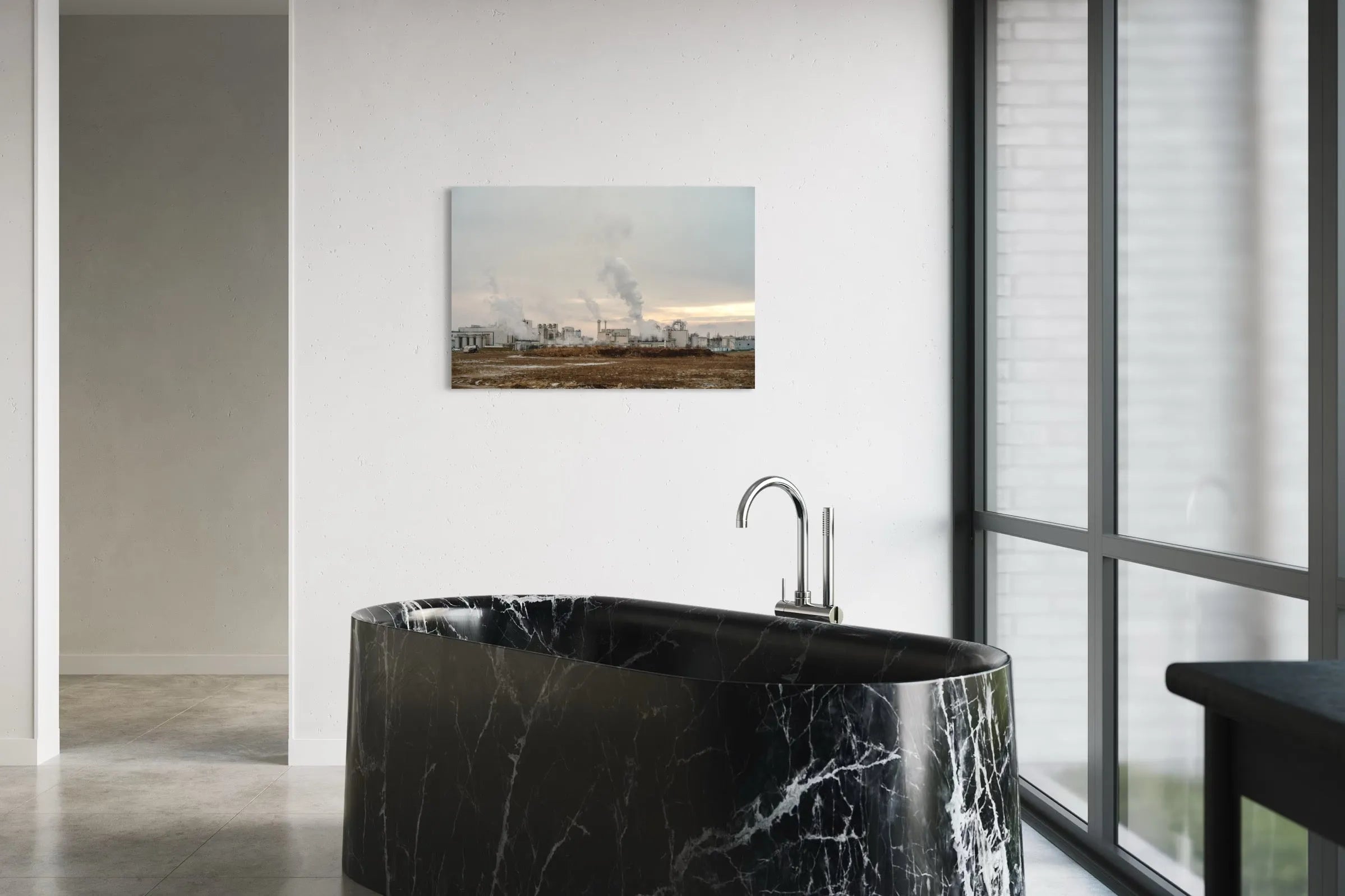 Black marble freestanding bathtub in a modern bathroom with the color fine art photograph Smoke by Ziggy Kańczukowski on the wall.